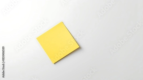 Obraz Single yellow sticky note placed on a white background