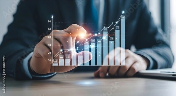 Obraz Businessman analyzing financial growth chart with hologram technology for business success