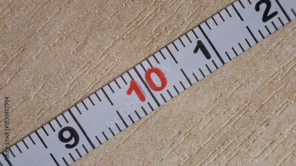 Obraz A measuring tape segment with visible 10 cm marking