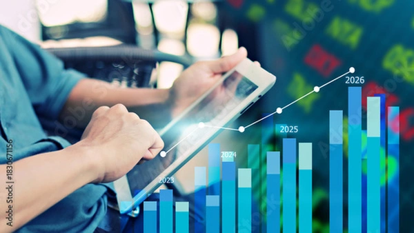 Fototapeta Businessman calculating financial data for long term investment growth goals. financial analysis concept, strategy planning and growth opportunities