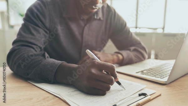 Fototapeta Working and checking documents in office