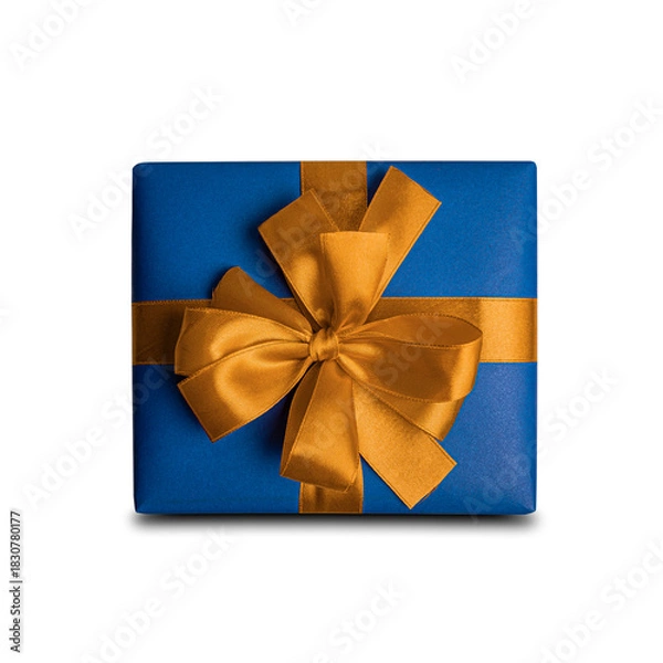 Fototapeta A single blue gift box with a large golden ribbon and bow is presented against a white background.