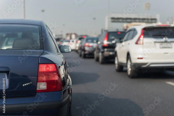 Fototapeta traffic jam with row of cars on toll way