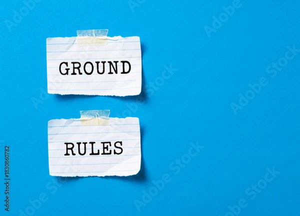 Fototapeta Ground Rules: Torn Paper Notes Tape On Bright Blue Background
