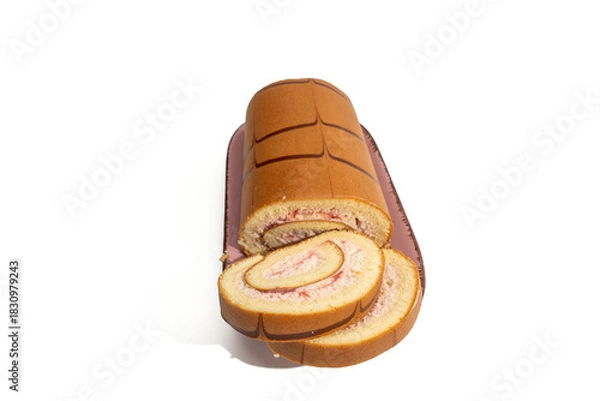Obraz Swiss roll on a platter with two slices in front, isolated on white. Strawberry cream spiral filling and chocolate striped sponge, studio food photo.