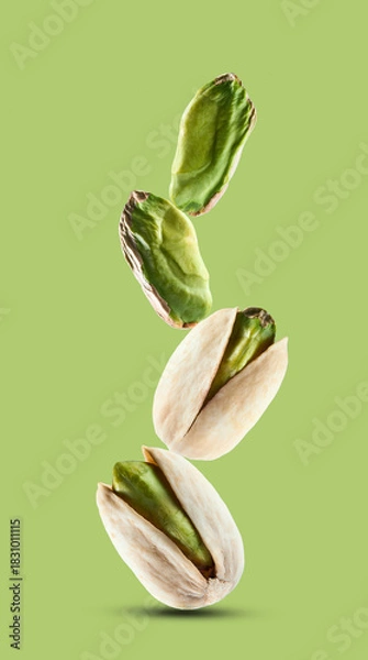 Obraz Stack pistachio nuts in closeup on pistachio background