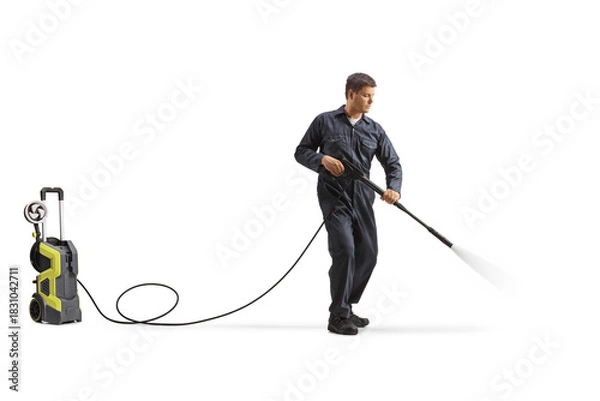 Obraz Worker cleaning with a high pressure washer machine