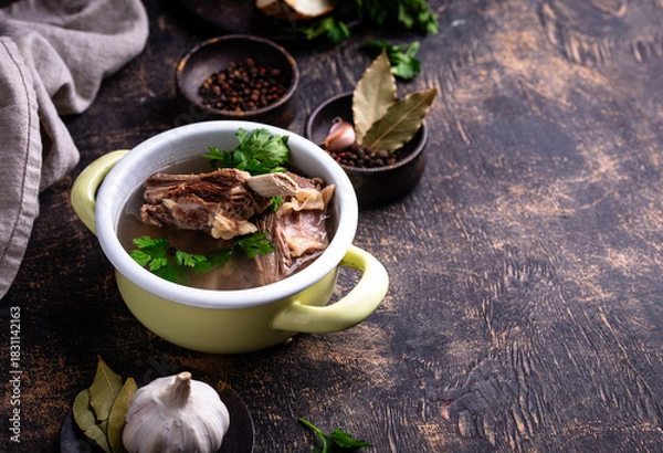 Obraz Boiled bone broth or bouillon with meat