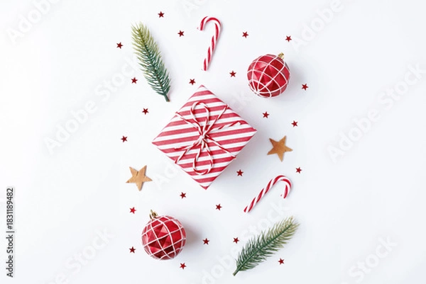 Obraz Christmas gift with decorations on white background
