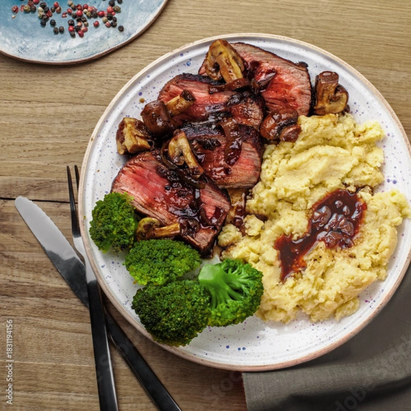 Obraz Sliced Medium Rare Steak with Mashed Potatoes and Broccoli