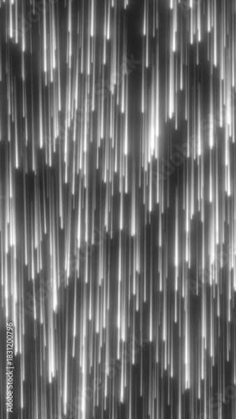 Fototapeta Vertical glowing light streaks resembling falling stars in monochrome style