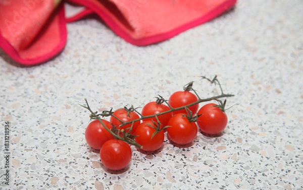 Fototapeta cherry tomatoes on a table