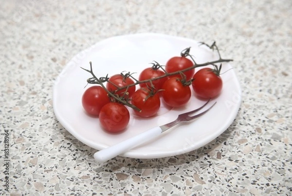 Fototapeta cherry tomatoes on a plate