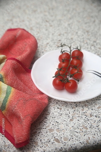 Fototapeta cherry tomatoes on a plate