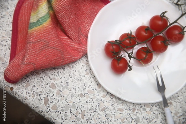 Fototapeta cherry tomatoes on a plate