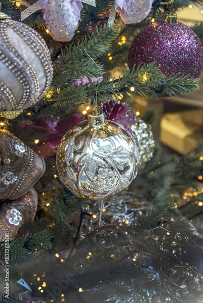 Fototapeta Christmas tree with a golden Christmas