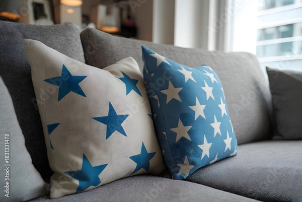 Obraz Close-up of star pillows on a gray sofa in the living room