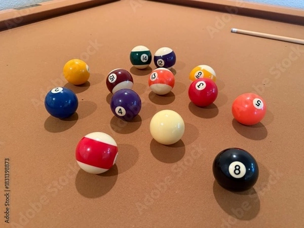Obraz Billiards Table 9-Ball Game: Pool table with beige felt cloth featuring multiple balls arranged for a game.