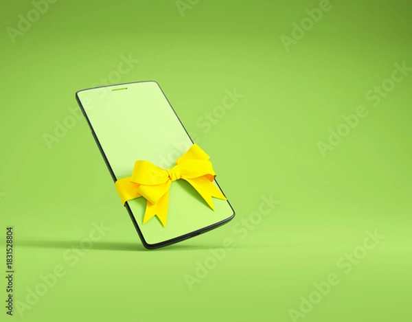 Obraz Creative smartphone gift concept with a yellow bow against a green background