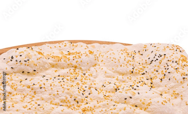 Fototapeta Soft bread topped with sesame and poppy seeds freshly baked in the morning