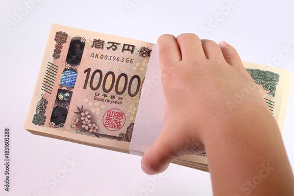 Obraz 札束を持つ子どもの手