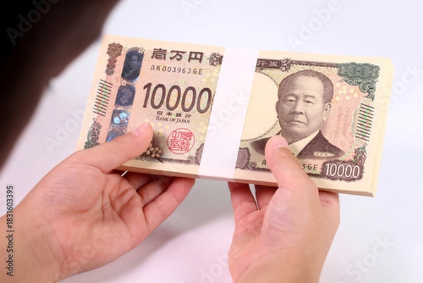 Obraz 札束を持つ子どもの手