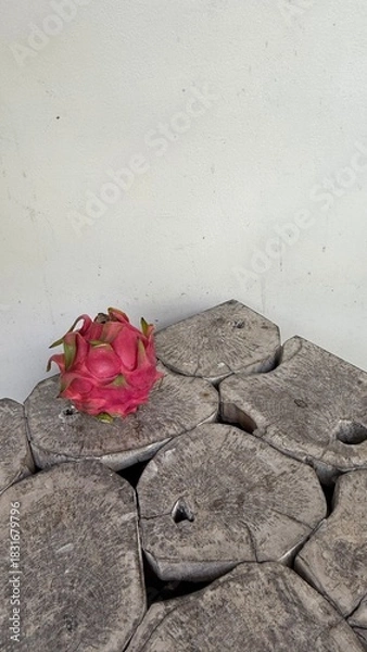 Obraz Vibrant Dragon Fruit on Rustic Wooden Log Table