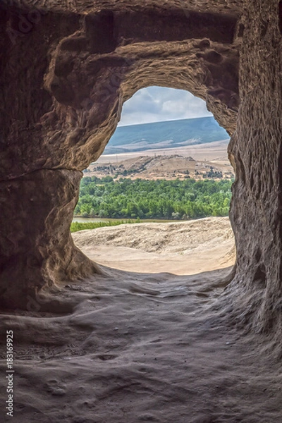 Fototapeta The exit of the cave