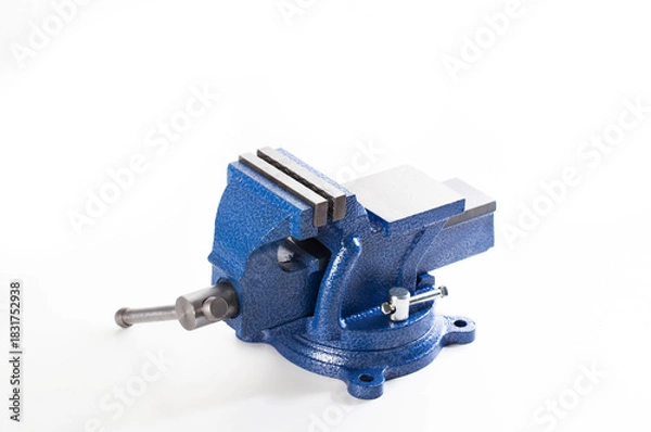Fototapeta Blue bench vise with textured finish, heavy duty metal tool for workshop use, clamping device for securing workpieces during various manual tasks