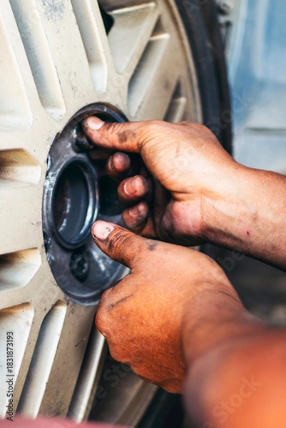 Fototapeta Vertical Mechanic man hands repairing car shop. Man hands fixing Car machinery vehicle mechanical service. Vertical horizon vehicle hood checking automobile. Car motor Workshop oil garage maintenance