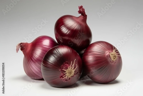 Fototapeta Pile of red onions isolated on white background