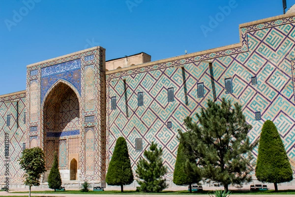 Fototapeta Uzbekistan architecture in Samarkand and Bukhara with intricate mosaics blue domes ancient madrasas Islamic patterns historic monuments vibrant tilework and cultural heritage in bright daylight