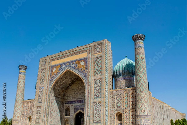 Fototapeta Uzbekistan architecture in Samarkand and Bukhara with intricate mosaics blue domes ancient madrasas Islamic patterns historic monuments vibrant tilework and cultural heritage in bright daylight