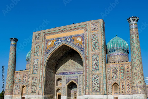 Fototapeta Uzbekistan architecture in Samarkand and Bukhara with intricate mosaics blue domes ancient madrasas Islamic patterns historic monuments vibrant tilework and cultural heritage in bright daylight