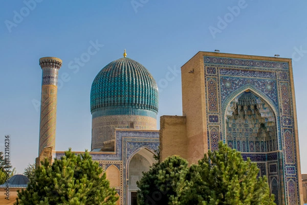 Fototapeta Uzbekistan architecture in Samarkand and Bukhara with intricate mosaics blue domes ancient madrasas Islamic patterns historic monuments vibrant tilework and cultural heritage in bright daylight