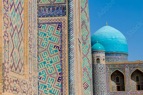 Fototapeta Uzbekistan architecture in Samarkand and Bukhara with intricate mosaics blue domes ancient madrasas Islamic patterns historic monuments vibrant tilework and cultural heritage in bright daylight