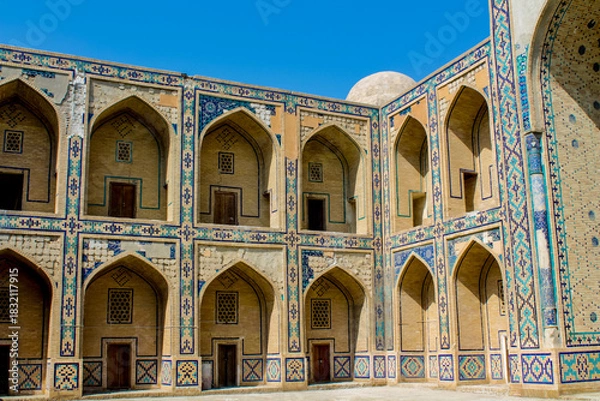 Fototapeta Uzbekistan architecture in Samarkand and Bukhara with intricate mosaics blue domes ancient madrasas Islamic patterns historic monuments vibrant tilework and cultural heritage in bright daylight