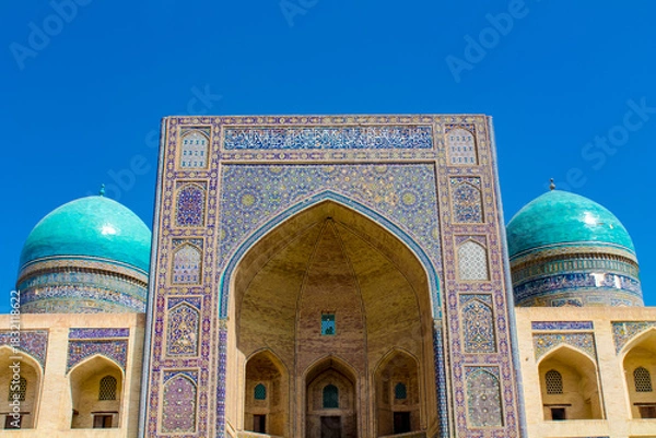 Fototapeta Uzbekistan architecture in Samarkand and Bukhara with intricate mosaics blue domes ancient madrasas Islamic patterns historic monuments vibrant tilework and cultural heritage in bright daylight