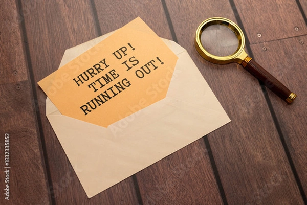 Obraz Time is running, text on notepad with clock on white background