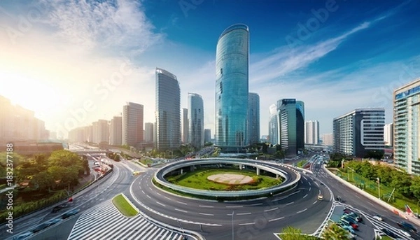 Obraz modern city roundabout with tall buildings and urban infrastructure
