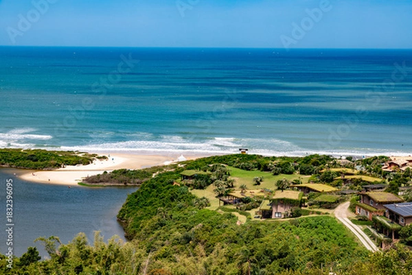Obraz Forest view with lake and ocean in background