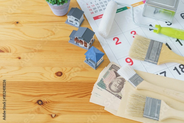 Fototapeta カレンダーと塗装道具と日本のお金｜DIY・リフォーム・塗装業者・スケジュールと費用　イメージ