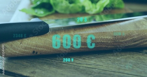 Fototapeta Showing curved wooden cutting board holding chef knife on table, with teal overlays and lettuce