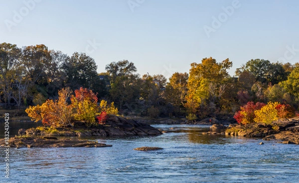 Obraz Scenic Woodruff Riverfront Park and Historic Riverfront Industrial District in Columbus, Georgia, at sunset