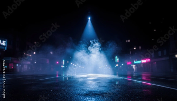 Fototapeta Blue spotlight background mist rises above wet asphalt reflecting neon lights at night creating moody urban atmosphere with distant blurred storefronts and empty street Background Concept