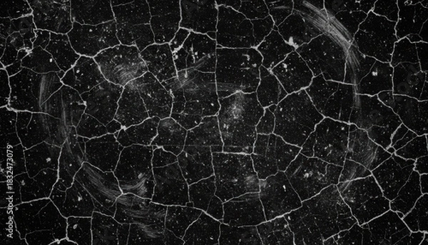 Fototapeta Cracked black background texture with peeling paint and fine dust creating moody abstract pattern background Background Concept