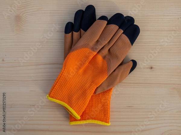 Fototapeta Winter warm work gloves. Gloves with palm coated in high-quality crinkle latex, finished with double-dipped black tips. Crinkle latex offers great grip properties 