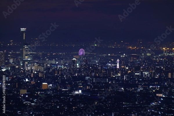 Obraz 光り輝く抽象的な街明かり 生駒山から見た、大阪平野夜景　海遊館観覧車