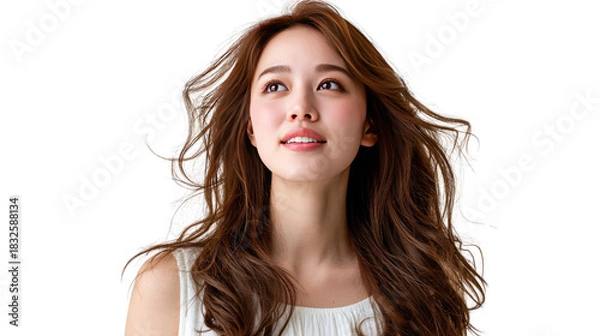 Obraz Dreamy gaze: A portrait of a woman with flowing brown hair, gazing upwards with a serene and hopeful expression. capturing a moment of quiet contemplation and introspection