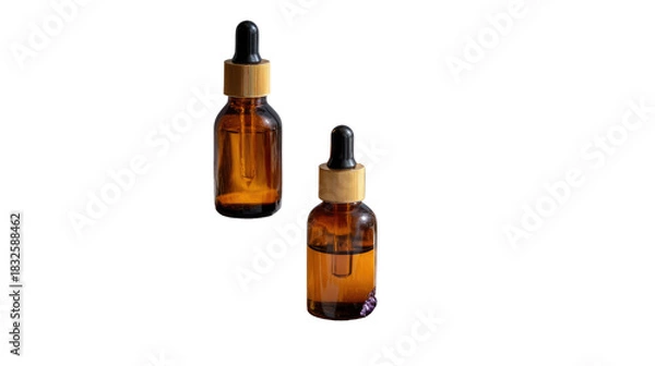 Obraz Essential Serum: Close-up of two amber glass bottles, each containing a translucent serum. The dropper is poised, ready to dispense this skincare elixir, promoting beauty.